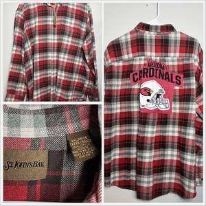 Custom thrifted upcycled machine sewn one of kind football flannel.